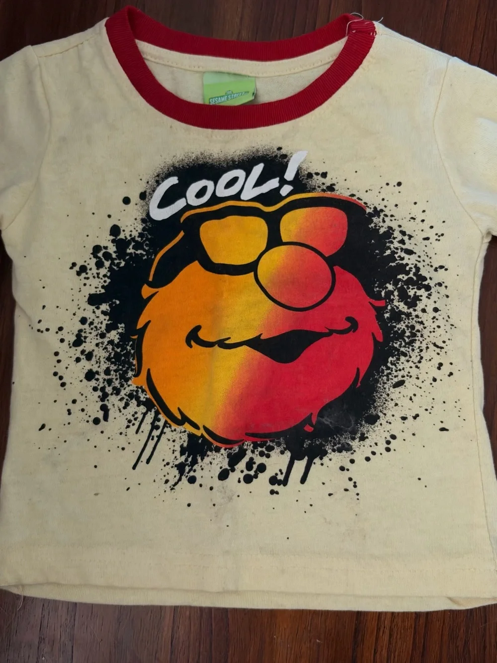 Sesame Street Yellow Tee with Red Trim and Orange-Red Character